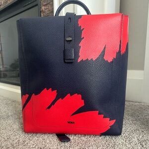 Simple, stylish, all leather Tumi backpack.